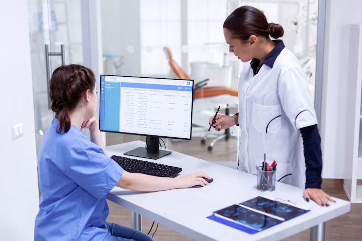 Medical billing specialists helping healthcare providers improve revenue cycle management